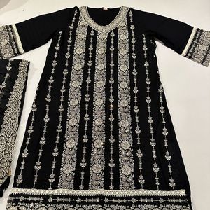 Beautiful Black Embroidered Kurta with matching bottoms and dupatta.